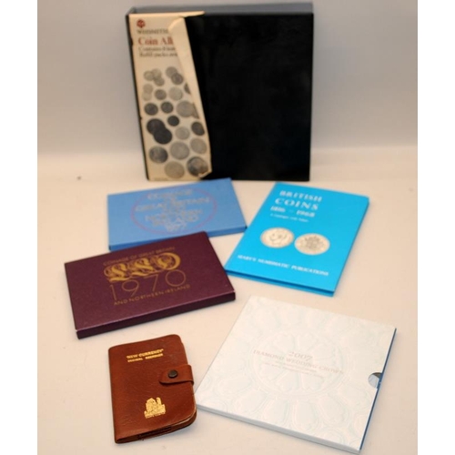 351 - A collection of GB coin collectors albums, part filled c/w with other coin related items and a silve... 