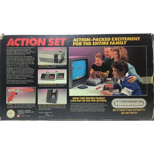 445 - NINTENDO ENTERTAINMENT SYSTEM. This Home console System Action set is a Nes Version complete with Co... 