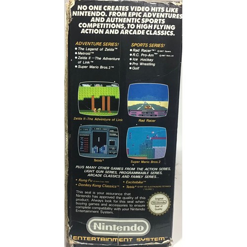 445 - NINTENDO ENTERTAINMENT SYSTEM. This Home console System Action set is a Nes Version complete with Co... 