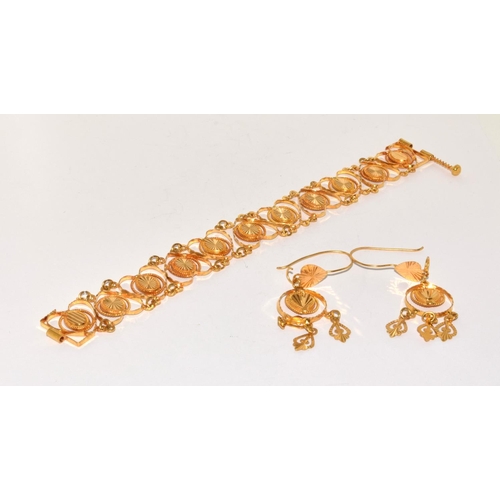 120 - 18ct yellow gold marked 21ct earrings and bracelet suite 22g