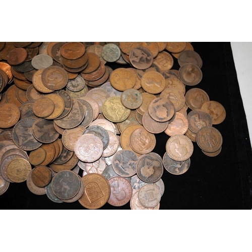 355 - Tin containing a large quantity of coins, mostly GB copper going back to Victoria. Also includes a f... 