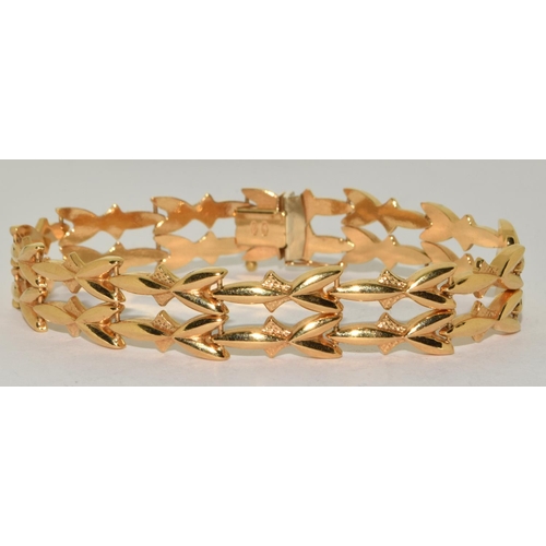 64 - 18ct gold articulated fancy link bracelet stamped 750 length 20cm 14g