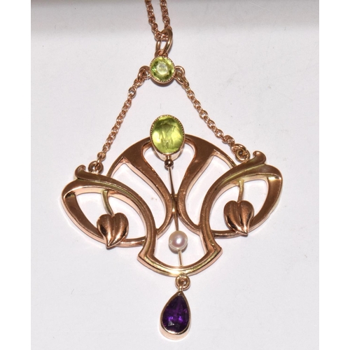 77 - Barnet Henry Joseph 9ct gold Art Nouveau Suffragette pendant set with Peridots, Pearls, and an Ameth... 