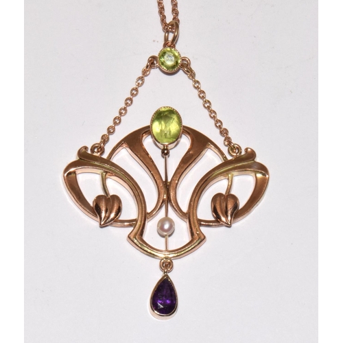 77 - Barnet Henry Joseph 9ct gold Art Nouveau Suffragette pendant set with Peridots, Pearls, and an Ameth... 