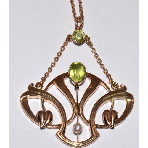 77 - Barnet Henry Joseph 9ct gold Art Nouveau Suffragette pendant set with Peridots, Pearls, and an Ameth... 