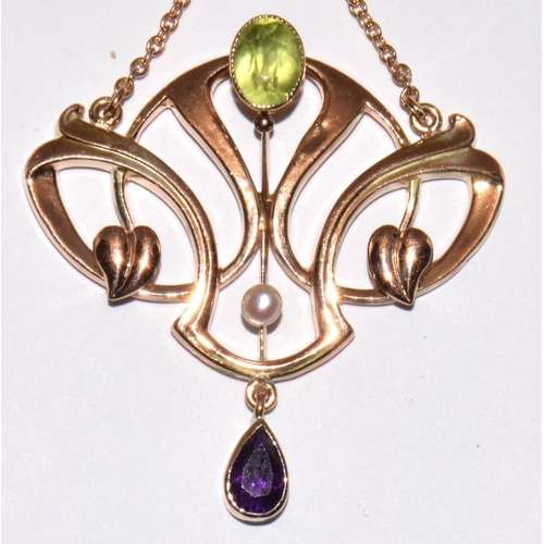 77 - Barnet Henry Joseph 9ct gold Art Nouveau Suffragette pendant set with Peridots, Pearls, and an Ameth... 