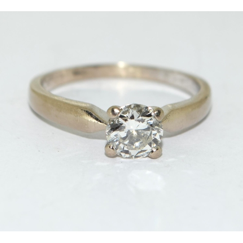 91 - Diamond solitaire approx 0.80 points set in 18ct gold ring, Size N, boxed