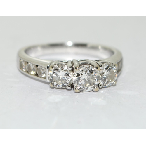 76 - Diamond 3 stone ring with diamond shoulders approx 1.00ct set in 18ct (tested) white gold ring Size ... 