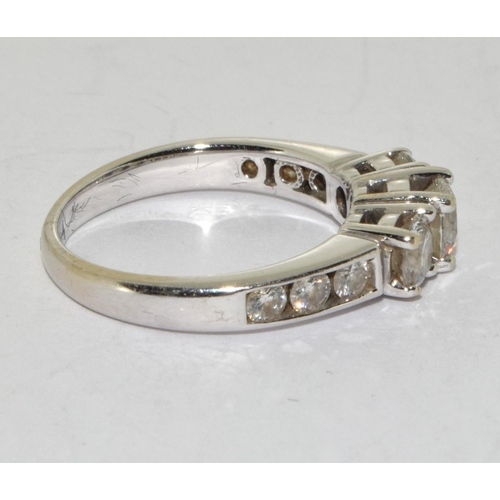 76 - Diamond 3 stone ring with diamond shoulders approx 1.00ct set in 18ct (tested) white gold ring Size ... 