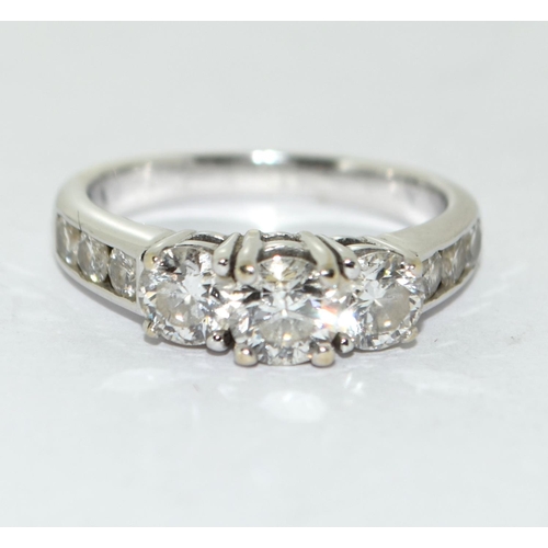 76 - Diamond 3 stone ring with diamond shoulders approx 1.00ct set in 18ct (tested) white gold ring Size ... 