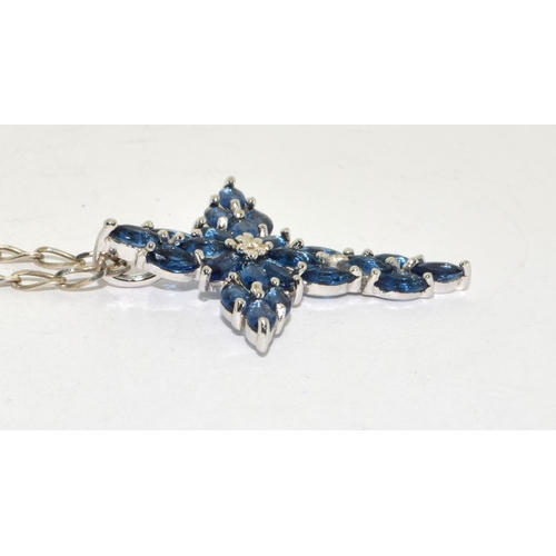 410 - Blue gemstone 925 silver crucifix and chain.