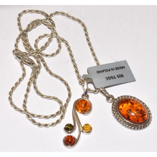 372 - 2 x new baltic amber 925 silver pendants and chain.