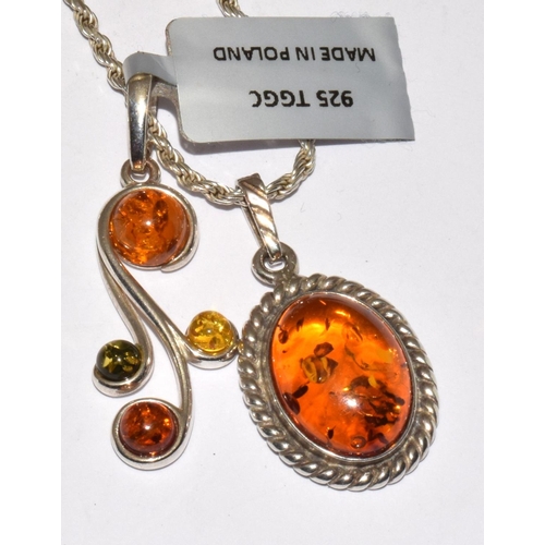 372 - 2 x new baltic amber 925 silver pendants and chain.