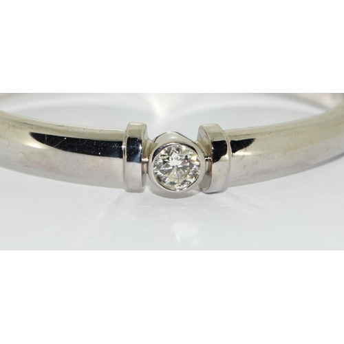 124 - 18ct white gold Diamond solitaire bangle Diamond is approx 1ct (New)