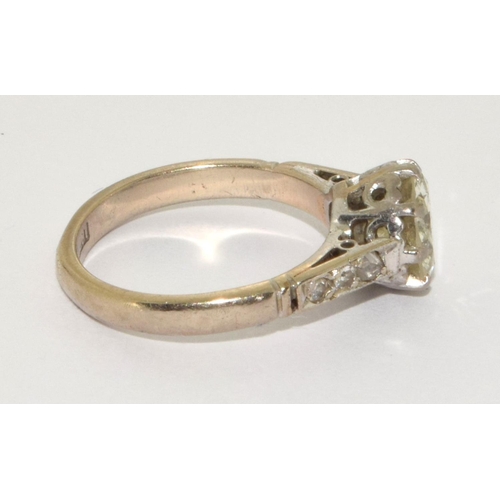 95 - 18ct gold ladies Diamond solitaire ring set with Diamond shoulders a central Old cut diamond of 1.3c... 