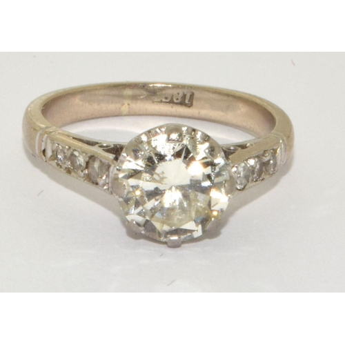 95 - 18ct gold ladies Diamond solitaire ring set with Diamond shoulders a central Old cut diamond of 1.3c... 