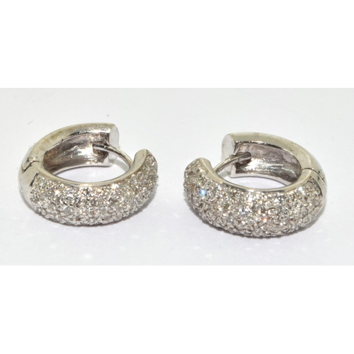 67 - A pair of heavy Pave set Diamond & 18ct gold Huggy earrings