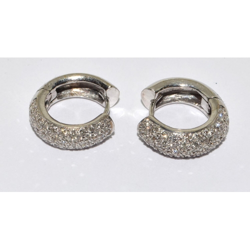 67 - A pair of heavy Pave set Diamond & 18ct gold Huggy earrings