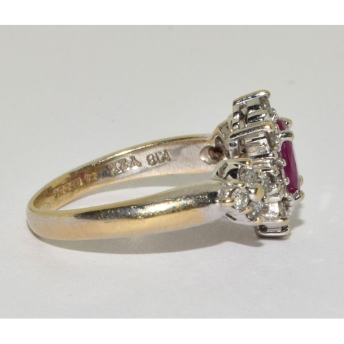 83 - Ruby and Diamond cluster ring set in 18ct gold size L