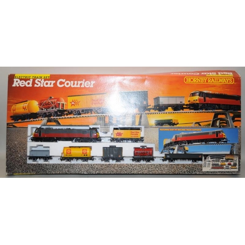 1143 - Hornby OO Gauge Red Star Courier Electric Train Set R759. Storage wear to box. Appears complete.