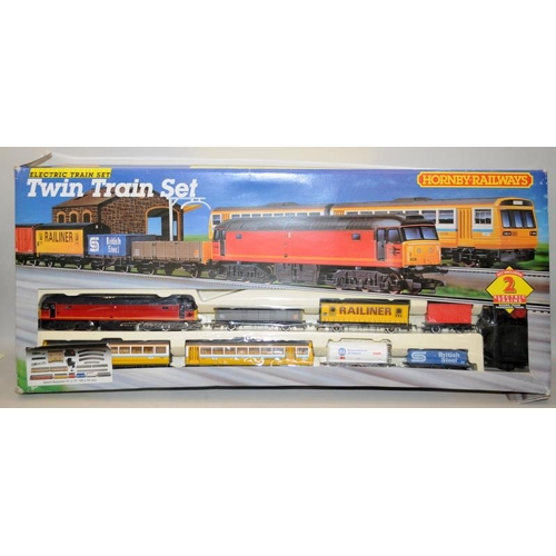 1170 - Hornby Twin Train Electric Train Set R346. Missing some track. Box has storage wear.