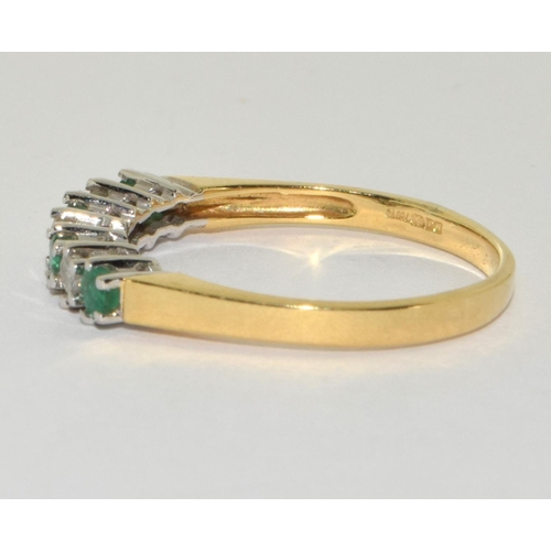 135 - Emerald diamond 7 stone 18ct gold ring Size Q