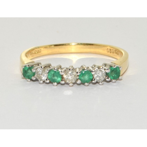 135 - Emerald diamond 7 stone 18ct gold ring Size Q