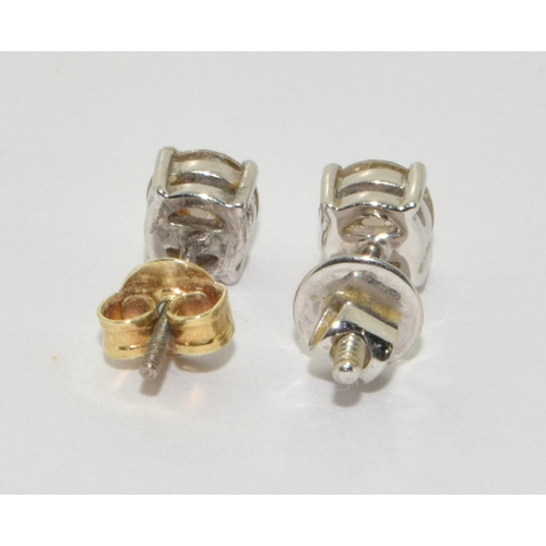 84 - Diamond earrings approx 0.33 points each set in 18ct gold.