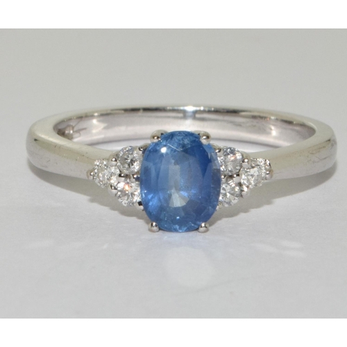 88 - Sapphire approx 0.50 points with 3 diamonds either side set in 18ct white gold ring Size N