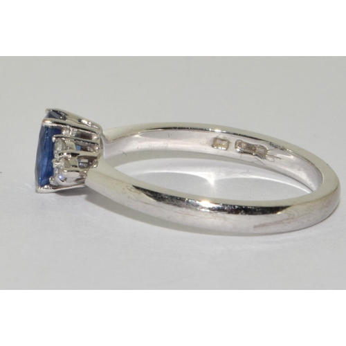 88 - Sapphire approx 0.50 points with 3 diamonds either side set in 18ct white gold ring Size N