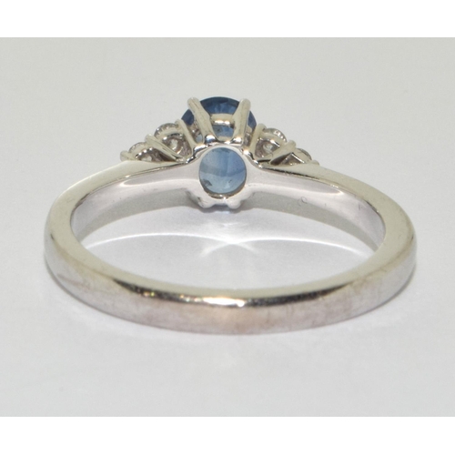 88 - Sapphire approx 0.50 points with 3 diamonds either side set in 18ct white gold ring Size N