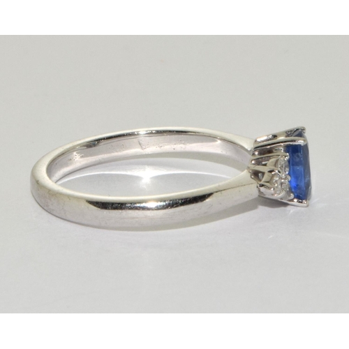 88 - Sapphire approx 0.50 points with 3 diamonds either side set in 18ct white gold ring Size N