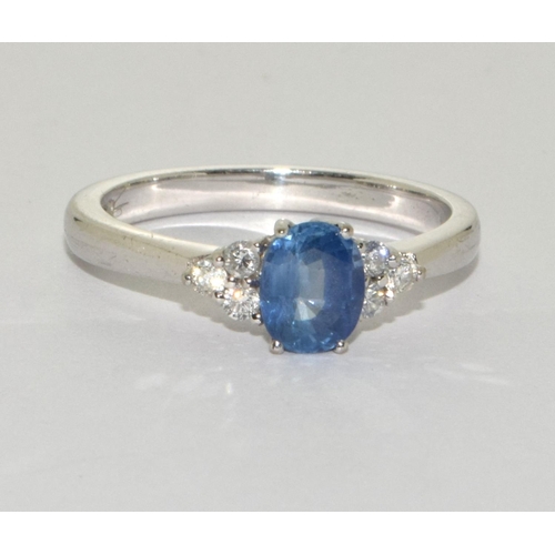 88 - Sapphire approx 0.50 points with 3 diamonds either side set in 18ct white gold ring Size N