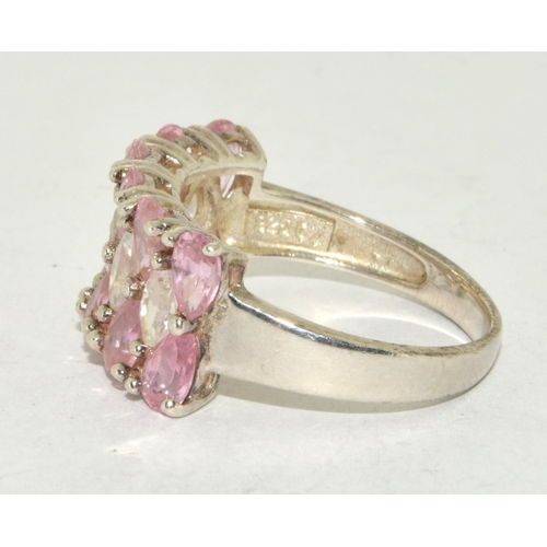 298 - A pink and white CZ and 925 silver ring Size P