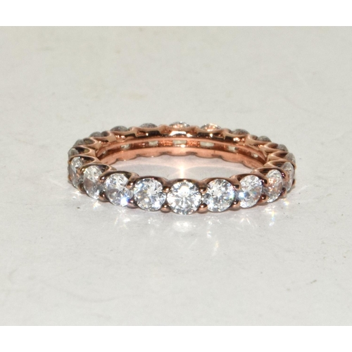 280 - A rose gold on 925 silver CZ eternity band, Size J