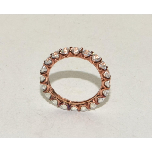 280 - A rose gold on 925 silver CZ eternity band, Size J