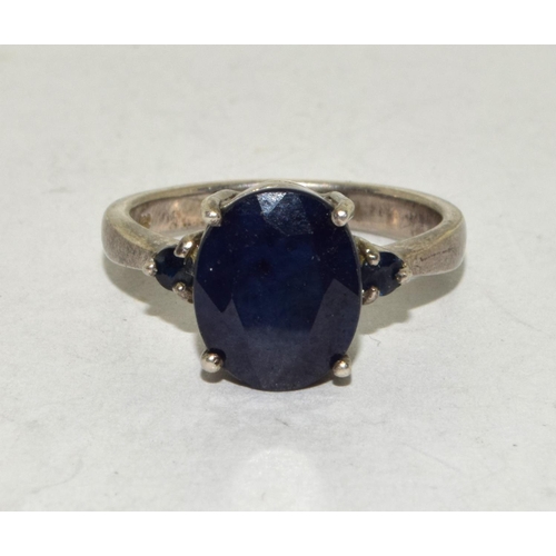 386 - A 925 silver and blue stone ring Size N