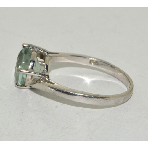 348 - A 925 silver and green stone solitaire ring Size S