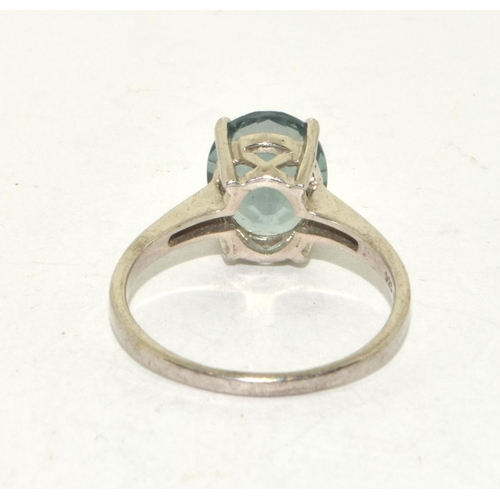 320 - A 925 silver and green stone solitaire ring size S