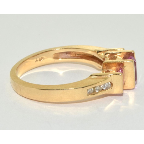 303 - 14ct gold ladies Pink Topaz and Diamond shoulder ring size O