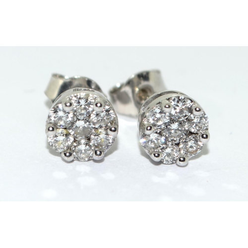 146 - Pair of 0.75ct Diamond cluster Earrings in 18ct white gold