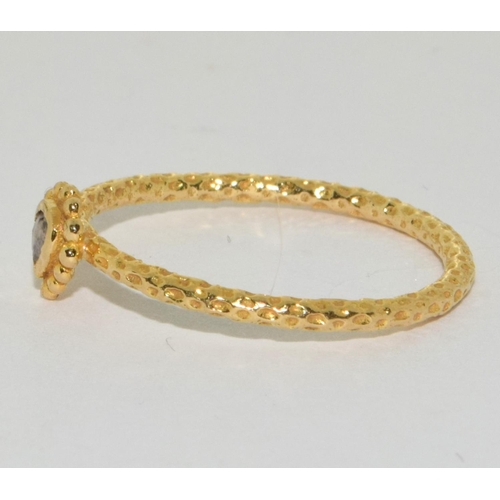 80 - An 18ct gold and diamond limited edition Satya ring Size N