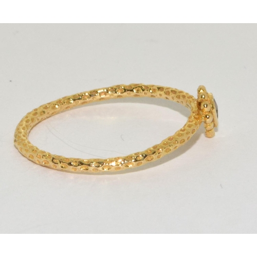 80 - An 18ct gold and diamond limited edition Satya ring Size N