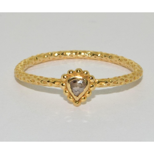 80 - An 18ct gold and diamond limited edition Satya ring Size N