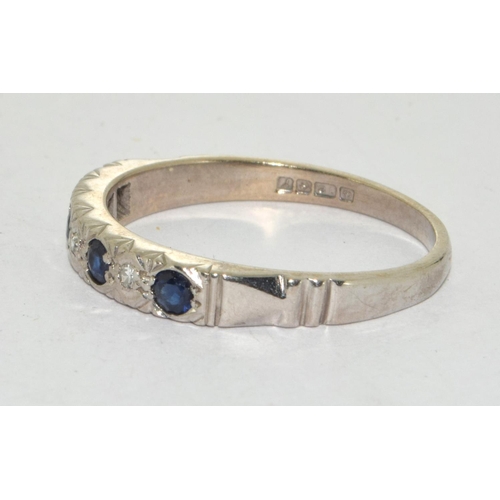 145 - 18ct white gold ladies Diamond and Sapphire 1/2 eternity ring size R