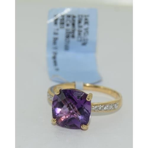 148 - 14ct gold ladies new with tags Amethyst and Diamond ring size N tag price $2400