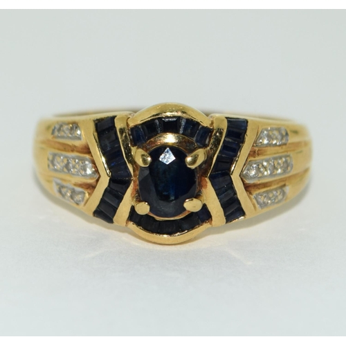 150 - 18ct gold ladies Diamond and Sapphire ring size O