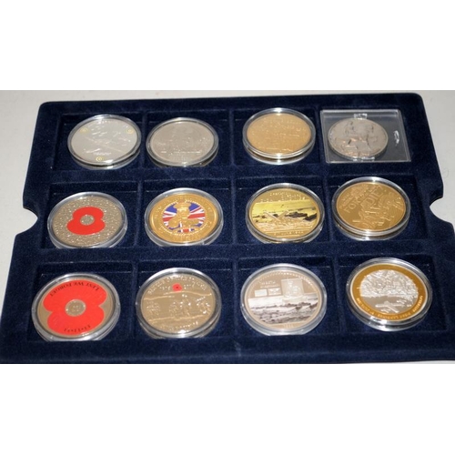 282 - Collection of crown size coins mostly commemorating WW1 and WW2, composition unknown. Lot also inclu... 