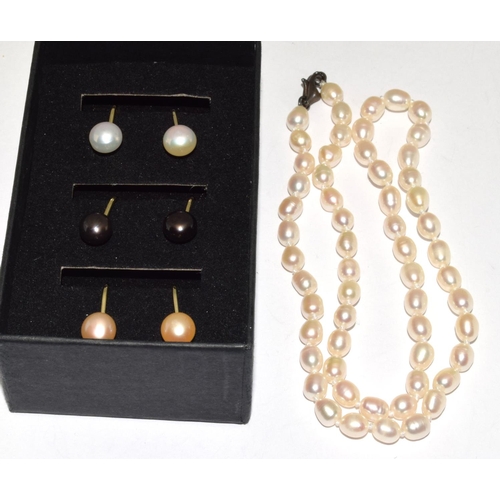 262 - 3 pairs of cultured pearl clip earrings and necklace.