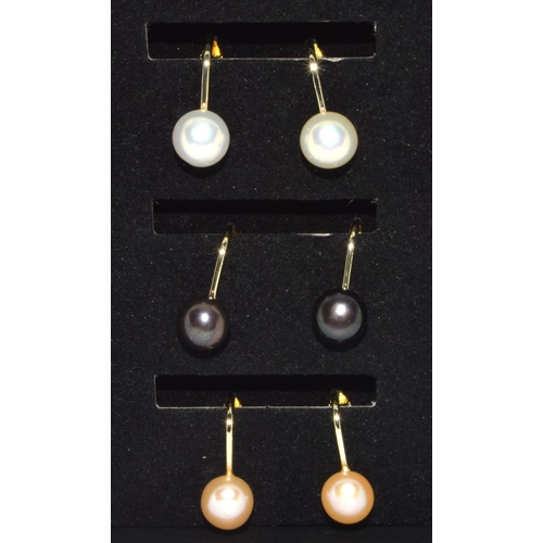 262 - 3 pairs of cultured pearl clip earrings and necklace.